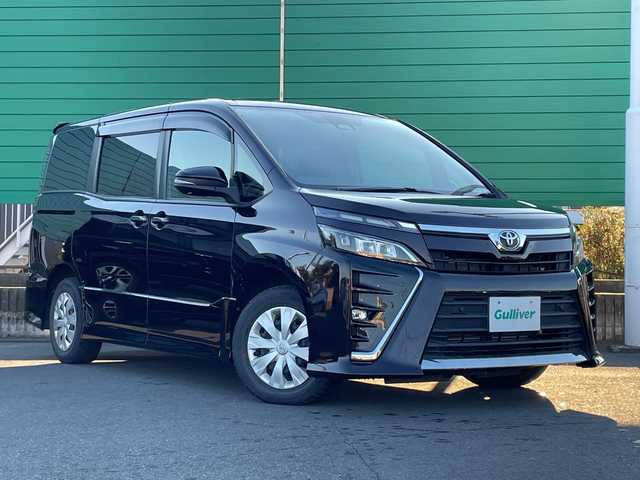 トヨタ ヴォクシー ZS 茨城県 2021(令3)年 2.9万km ボルドーマイカメタリック トヨタセーフティーセンス/フリップダウンモニター/社外ナビ/フルセグTV/Bluetooth/バックカメラ/両側パワースライドドア/クルーズコントロール/横滑り防止装置/衝突軽減システム/パーキングアシスト/アイドリングストップ/レーンキープ/オートライト/オートマチックハイビーム/LEDヘッドライト/コーナーセンサー