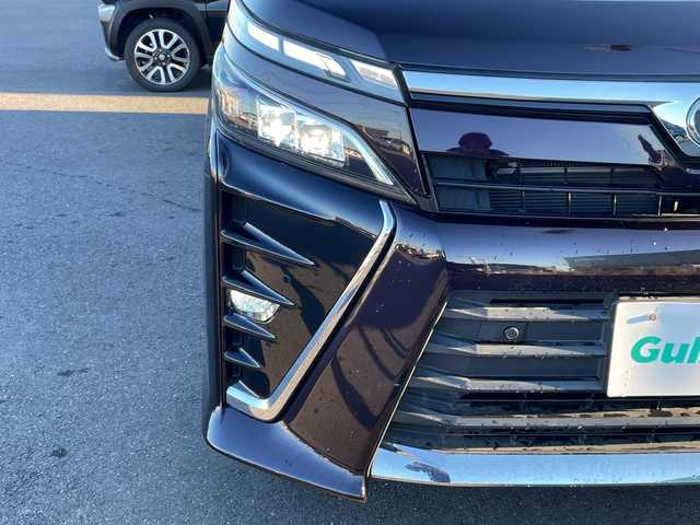 トヨタ ヴォクシー ZS 茨城県 2021(令3)年 2.9万km ボルドーマイカメタリック トヨタセーフティーセンス/フリップダウンモニター/社外ナビ/フルセグTV/Bluetooth/バックカメラ/両側パワースライドドア/クルーズコントロール/横滑り防止装置/衝突軽減システム/パーキングアシスト/アイドリングストップ/レーンキープ/オートライト/オートマチックハイビーム/LEDヘッドライト/コーナーセンサー