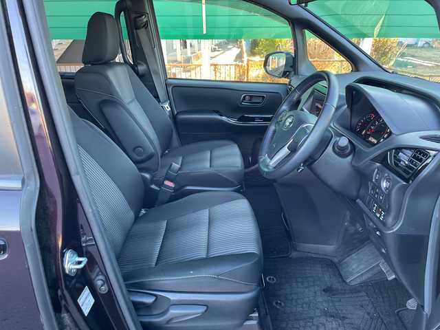 トヨタ ヴォクシー ZS 茨城県 2021(令3)年 2.9万km ボルドーマイカメタリック トヨタセーフティーセンス/フリップダウンモニター/社外ナビ/フルセグTV/Bluetooth/バックカメラ/両側パワースライドドア/クルーズコントロール/横滑り防止装置/衝突軽減システム/パーキングアシスト/アイドリングストップ/レーンキープ/オートライト/オートマチックハイビーム/LEDヘッドライト/コーナーセンサー