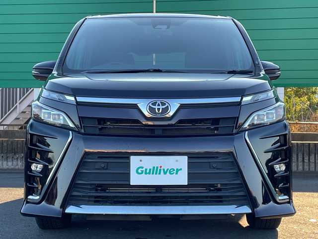トヨタ ヴォクシー ZS 茨城県 2021(令3)年 2.9万km ボルドーマイカメタリック トヨタセーフティーセンス/フリップダウンモニター/社外ナビ/フルセグTV/Bluetooth/バックカメラ/両側パワースライドドア/クルーズコントロール/横滑り防止装置/衝突軽減システム/パーキングアシスト/アイドリングストップ/レーンキープ/オートライト/オートマチックハイビーム/LEDヘッドライト/コーナーセンサー