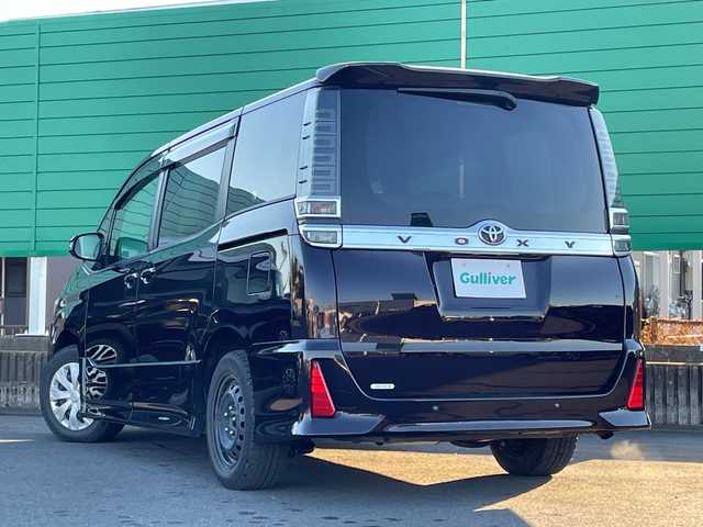 トヨタ ヴォクシー ZS 茨城県 2021(令3)年 2.9万km ボルドーマイカメタリック トヨタセーフティーセンス/フリップダウンモニター/社外ナビ/フルセグTV/Bluetooth/バックカメラ/両側パワースライドドア/クルーズコントロール/横滑り防止装置/衝突軽減システム/パーキングアシスト/アイドリングストップ/レーンキープ/オートライト/オートマチックハイビーム/LEDヘッドライト/コーナーセンサー