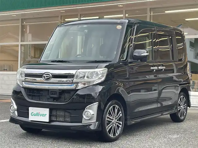 ダイハツ タント カスタム RS SA 岐阜県 2014(平26)年 10.3万km ブラックマイカメタリック ワンオーナー/４WD/純正ナビ(AM/FM/TV/DVD/Bluetooth)/フリップダウンモニター/両側パワースライドドア/スマートアシスト/バックカメラ/ドライブレコーダー前後/プッシュスタート/スマートキー/ETC/LEDヘッドライト/純正アルミホイール/スペアキー/保証書/取扱説明書