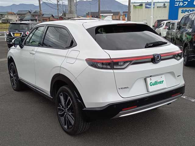 ホンダ ヴェゼル ハイブリッド e:HEV Z 新潟県 2021(令3)年 3.2万km プラチナホワイトパール 4WD/衝突被害軽減システム/レーダークルーズコントロール/純正ナビ（VXU-215VZi）/・（フルセグTV/CD/DVD/Bluetooth）/バックカメラ/ETC/ステアリングスイッチ/パドルシフト/前後ドライブレコーダー/オートブレーキホールド/シートヒーター/オートLEDライト/電動格納ウィンカーミラー/スマートキー