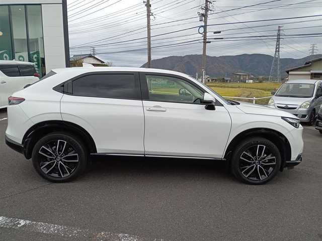 ホンダ ヴェゼル ハイブリッド e:HEV Z 新潟県 2021(令3)年 3.2万km プラチナホワイトパール 4WD/衝突被害軽減システム/レーダークルーズコントロール/純正ナビ（VXU-215VZi）/・（フルセグTV/CD/DVD/Bluetooth）/バックカメラ/ETC/ステアリングスイッチ/パドルシフト/前後ドライブレコーダー/オートブレーキホールド/シートヒーター/オートLEDライト/電動格納ウィンカーミラー/スマートキー