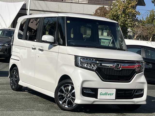 ホンダ Ｎ ＢＯＸ カスタム G L ホンダセンシング 熊本県 2018(平30)年 3.9万km プラチナホワイトパール 純正ナビ（VXM-184VFi）/【フルセグTV/CD/DVD/Bluetooth/ラジオ】/バックカメラ/前シーケンシャルウィンカー/前後ドライブレコーダー（ZDR-015）/片側パワースライドドア/レーダークルーズコントロール/衝突軽減ブレーキ/先行車発進お知らせ機能/レーンキープアシスト/標識認識機能/障害物センサー/ECON/ビルトインETC/純正14インチAW/オートライト/フォグランプ/LEDヘッドライト/ステアリングスイッチ/純正フロアマット/保証書/取扱説明書