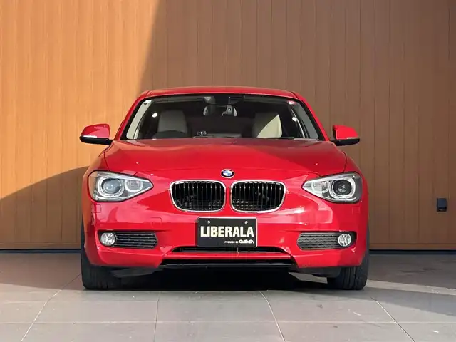 ＢＭＷ １１６ｉ 愛知県 2012(平24)年 7.6万km 赤Ｍ 純正ナビ/Bluetooth/CD/DVD/AUX/白革シート/シートヒーター/パワーシート/ETC/HIDヘッドライト/純正フロアマット/純正16インチアルミホイール/保証書/取扱説明書/スマートキー/スペアキー×1