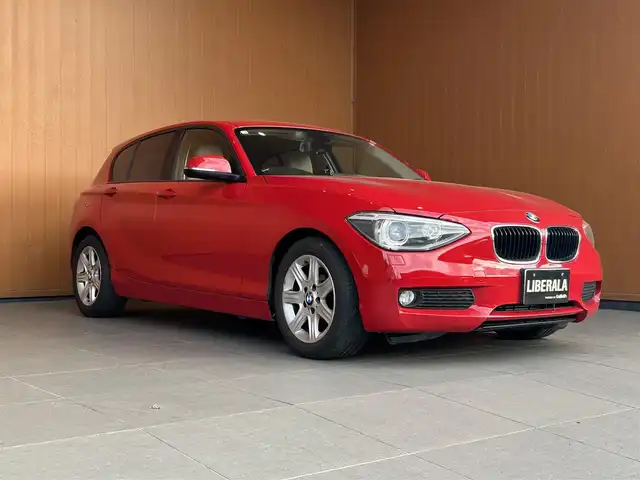 ＢＭＷ １１６ｉ 愛知県 2012(平24)年 7.6万km 赤Ｍ 純正ナビ/Bluetooth/CD/DVD/AUX/白革シート/シートヒーター/パワーシート/ETC/HIDヘッドライト/純正フロアマット/純正16インチアルミホイール/保証書/取扱説明書/スマートキー/スペアキー×1