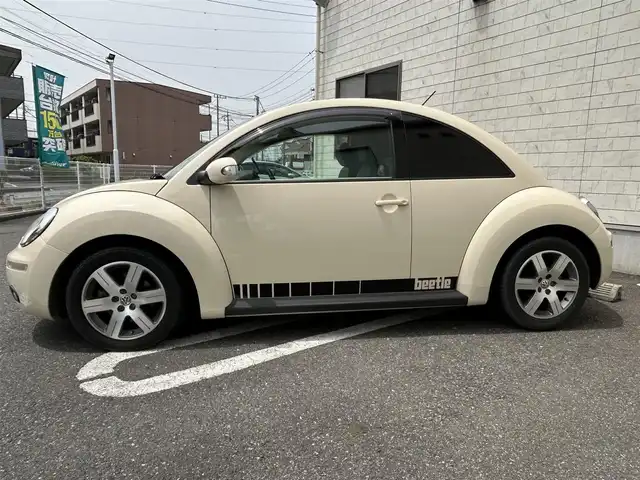 フォルクスワーゲン ニュー ビートル 埼玉県 2008(平20)年 10.6万km ハーベストムーンベージュ 横滑り防止装置 /MTモード付AT車 /シートリフタ― /社外前後ドライブレコーダー /社外ETC /　（CY-ET907KDW）/リモコンキー /スペアキー
