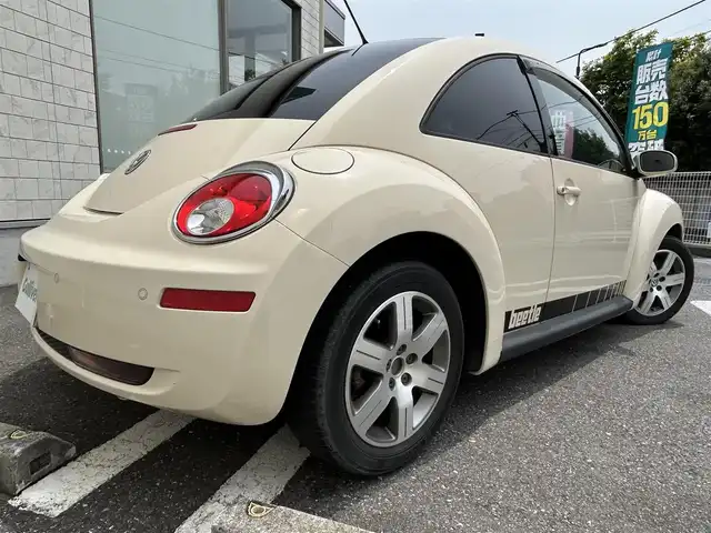 フォルクスワーゲン ニュー ビートル 埼玉県 2008(平20)年 10.6万km ハーベストムーンベージュ 横滑り防止装置 /MTモード付AT車 /シートリフタ― /社外前後ドライブレコーダー /社外ETC /　（CY-ET907KDW）/リモコンキー /スペアキー