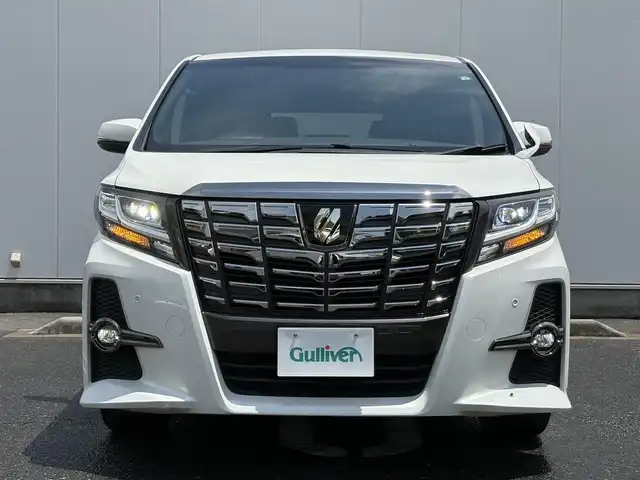 トヨタ アルファード S Aパッケージ タイプブラック 三重県 2017(平29)年 7.5万km ホワイトパールクリスタルシャイン 12.8インチフリップダウンモニター/9インチフローティングナビ(Bluetooth/CD/DVD/SD/地デジTV/USB/HDMI/AM/FM)/20インチアルミホイール(ロクサーニ)/バックカメラ/ドライブレコーダー/ETC/両側パワースライドドア/パワーバックドア/クルーズコントロール/クリアランスソナー/バックソナー/ブラック木目調/革巻きコンビステアリングホイール/クロコ柄合皮/ブラックウルトラスエードコンビシート/アクセサリーコンセント/助手席スーパーロングスライドシート/マニュアルオットマン/2列目リラックスキャプテンシート/折畳式サイドテーブル/LEDヘッドランプ/フロントフォグランプ