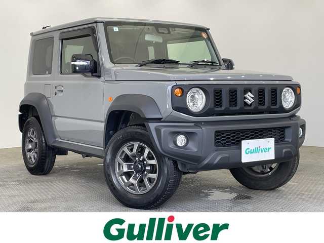 スズキ ジムニー シエラ JC 栃木県 2021(令3)年 5.2万km ミディアムグレー ワンオーナー/パートタイム4WD/純正ナビ/（CD/DVD/Bluetooth/フルセグTV）/バックカメラ/スズキセーフティサポート/・デュアルセンサーブレーキサポート/・誤発進抑制機能/・車線逸脱抑制機能/・車線逸脱警報機能/・ふらつき警報機能/・先行車発進お知らせ機能/・標識認識機能/・ハイビームアシスト/ETC/ドライブレコーダー/オートライト/LEDヘッドライト/ダウンヒルアシストコントロール/センターデフロック/純正15インチAW/純正フロアマット