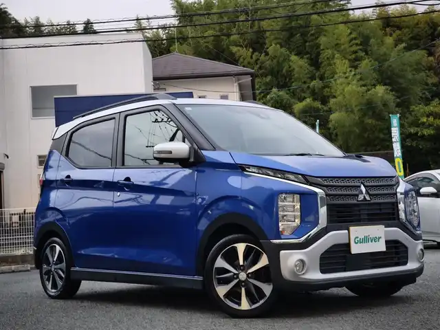 三菱 ｅＫクロス T 熊本県 2019(平31)年 10.9万km ライトニングブルーマイカ/スターリングシルバーメタリック 社外ナビ（MDV-Z702）/【フルセグTV/Bluetooth/CD/DVD】/衝突軽減ブレーキ/コーナーセンサー/車線逸脱警報/オートLEDライト/プッシュスタート/スマートキー/ウィンカーミラー/前席シートヒーター/革巻きステアリング/ステアリングスイッチ/純正１５インチAW/ETC/横滑り防止装置/ABS/社外フロアマット/保証書/取扱説明書/スペアキー