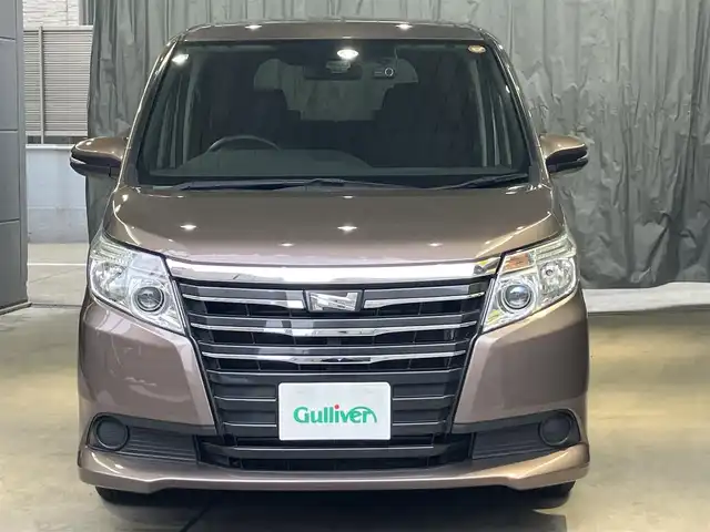 トヨタ ノア X 東京都 2016(平28)年 1.7万km ダークシェリーマイカM ワンオーナー/セーフティセンス/・プリクラッシュセーフティ/・レーンディパチャーアラート/・オートマチックハイビーム/・先行車発進告知機能/純正9インチナビ/バックカメラ/片側パワースライドドア/LEDヘッドライト/ドライブレコーダー前後/ステリングリモコン/ウィンカーミラー/アイドリングストップ/ビルトインETC/スマートキー/ディーラー記録簿/保証書・取扱説明書・スペアキー