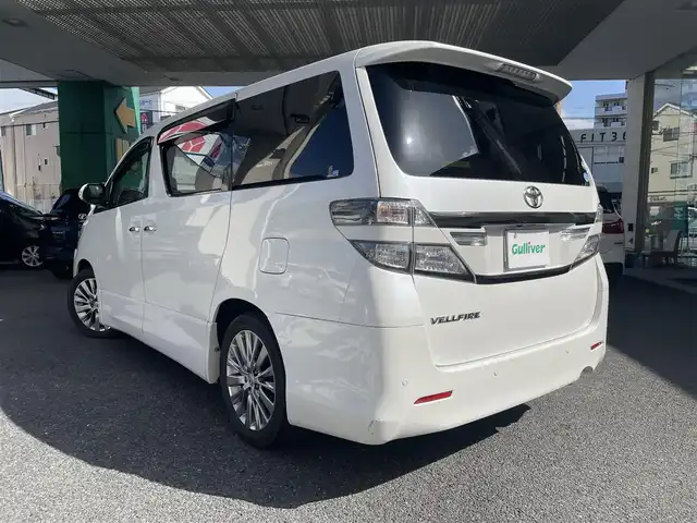 トヨタ ヴェルファイア 2．4Z ゴールデンアイズ 大阪府 2013(平25)年 11.5万km ホワイトパールクリスタルシャイン 純正HDDナビ/フルセグTV/DVD再生/Bluetoothオーディーオ/純正フリップダウンモニター/ツインムーンルーフ/両側パワースライドドア/パワーバックドア/クルコン/ビルトインETC/オートリトラミラー/純正HID