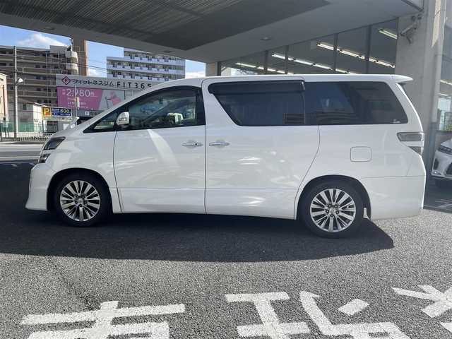 トヨタ ヴェルファイア 2．4Z ゴールデンアイズ 大阪府 2013(平25)年 11.5万km ホワイトパールクリスタルシャイン 純正HDDナビ/フルセグTV/DVD再生/Bluetoothオーディーオ/純正フリップダウンモニター/ツインムーンルーフ/両側パワースライドドア/パワーバックドア/クルコン/ビルトインETC/オートリトラミラー/純正HID