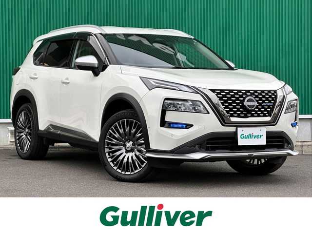 日産 エクストレイル オーテック e-4ORCE アドバンスドPKG 宮城県 2023(令5)年 0.8万km ブリリアントホワイトパール プロパイロット/プロパイロットパーキング/360度セーフティアシスト/・インテリジェントエマージェンシーブレーキ/・踏み間違い衝突防止アシスト/・標識検知機能/・前方衝突予測警報/・ふらつき警報/・車線逸脱防止支援システム/・車線逸脱警報/・後側方衝突防止支援システム/・後側方車両検知警報/・後退時車両検知警報/インテリジェントルームミラー/インテリジェントアラウンドビューモニター/NissannConnectナビ/・12.3インチディスプレイ/・AppleCarPlay/AndroidAuto/・AmazonAlexa/・フルセグTV/・USB接続/・ETC2.0/ドライブレコーダー/ワイヤレス充電器/AC100V/1500W/ハンズフリーパワーバックドア/革シート/パワーシート（運転席メモリー機能付）/シートヒーター/ステアリングヒーター/アダプティブLEDヘッドランプ/シーケンシャルターンランプ/オートライト/電動パーキングブレーキ/ブレーキホールド/電動格納ミラー/シルバールーフレール/純正20インチAW/フロアマット/ドアバイザー