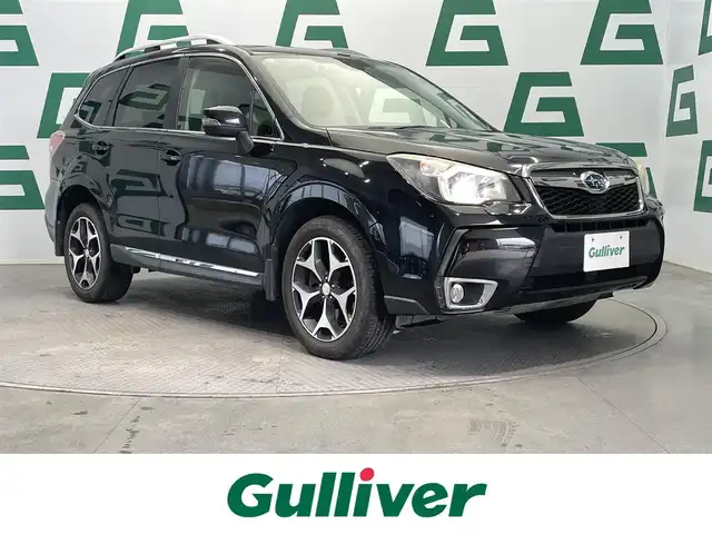 スバル フォレスター 2．0XT アイサイト 鹿児島県 2014(平26)年 9.9万km クリスタルブラックシリカ 禁煙車/純正7インチナビ(CN-R300WD)/　・Bluetooth/　・CD/DVD/　・AM/FM/　・USB/　・iPod/　・フルセグTV/アイサイト/　・クルーズコントロール/　・レーンキープアシスト/　・オートマチックハイビーム/X-MODE/ETC/バックカメラ/前席パワーシート/前席シートヒーター/オートワイパー/電動格納ミラー/純正アルミホイール/純正フロアマット