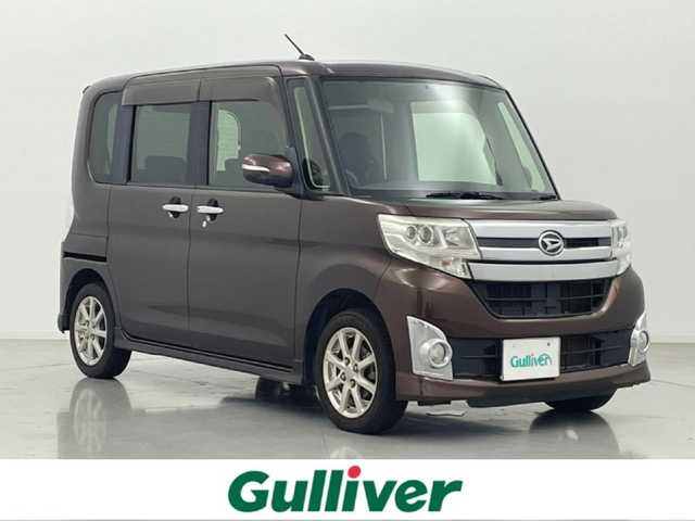 ダイハツ タント カスタム X 熊本県 2014(平26)年 5.6万km 茶 ワンオーナー　/禁煙車　/純正ナビ（ＣＤ・ＤＶＤ・フルセグ・ＢＴ・ＳＤ・ｉｐｏｄ・ＵＳＢ）/バックカメラ　/片側パワースライドドア　/アイドリングストップ　/電動格納ミラー/オートエアコン/純正フロアマット/純正１４インチAW/オートライト　/ＨＩＤライト/フォグライト/スマートキー/プッシュスタート/保証書/取扱説明書