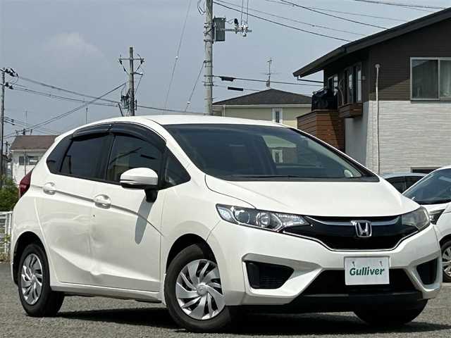 ホンダ フィット 13G FパックコンフォートED 宮城県 2016(平28)年 6万km プレミアムホワイトパールⅡ ワンオーナー/社外ディスプレイオーディオ/DVD・CD/USB/FM・AM/AUX/純正フロアマット/スマートキー/スペアキー×1/シートヒーターDN席/アイドリングストップ/横滑り防止