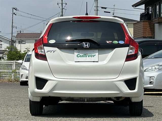 ホンダ フィット 13G FパックコンフォートED 宮城県 2016(平28)年 6万km プレミアムホワイトパールⅡ ワンオーナー/社外ディスプレイオーディオ/DVD・CD/USB/FM・AM/AUX/純正フロアマット/スマートキー/スペアキー×1/シートヒーターDN席/アイドリングストップ/横滑り防止