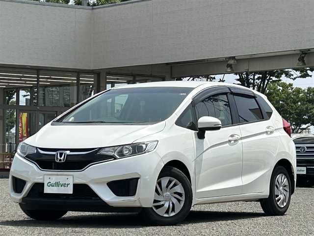 ホンダ フィット 13G FパックコンフォートED 宮城県 2016(平28)年 6万km プレミアムホワイトパールⅡ ワンオーナー/社外ディスプレイオーディオ/DVD・CD/USB/FM・AM/AUX/純正フロアマット/スマートキー/スペアキー×1/シートヒーターDN席/アイドリングストップ/横滑り防止