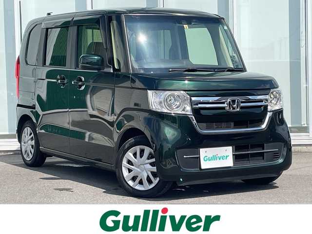 ホンダ Ｎ ＢＯＸ L 神奈川県 2022(令4)年 1.8万km ブリティッシュグリーンP 純正ＳＤナビ（UXM-225CI）/Bluetooth/CD/DVD/iPod/USB/パワースライドドア/追従走行付きクルーズコントロール/バックカメラ/コーナーセンサー/シートヒーター/ビルトインＥＴＣ/ＬＥＤヘッドライト/オートライト/スマートキー/プッシュスタート/純正フロアマット/ABS/横滑り防止装置/レーンキープアシスト/衝突被害軽減システム