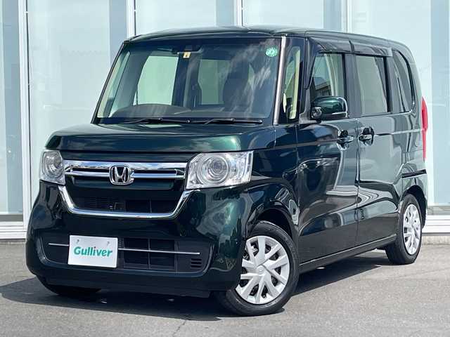 ホンダ Ｎ ＢＯＸ L 神奈川県 2022(令4)年 1.8万km ブリティッシュグリーンP 純正ＳＤナビ（UXM-225CI）/Bluetooth/CD/DVD/iPod/USB/パワースライドドア/追従走行付きクルーズコントロール/バックカメラ/コーナーセンサー/シートヒーター/ビルトインＥＴＣ/ＬＥＤヘッドライト/オートライト/スマートキー/プッシュスタート/純正フロアマット/ABS/横滑り防止装置/レーンキープアシスト/衝突被害軽減システム