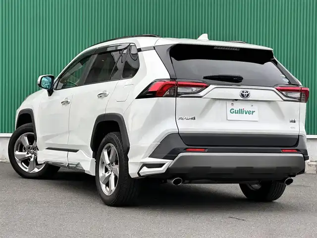 トヨタ ＲＡＶ４ ハイブリッドG 宮城県 2021(令3)年 4.3万km ホワイトパールクリスタルシャイン パノラマムーンルーフ/デジタルインナーミラー/＝＝＝/モデリスタエアロ（F/S/R）/セーフティセンス/・プリクラッシュセーフティ/・レーントレーシングアシスト/・レーダークルーズコントロール/・オートマチックハイビーム/・ロードサインアシスト/先行車発進告知/インテリジェントクリアランスソナー/リアクロストラフィックオートブレーキ/ブラインドスポットモニター/9インチディスプレイオーディオ/・ナビ機能付/・Bluetooth/・フルセグTV/・AppleCarPlay/AndroidAuto/パノラミックビューモニター/ビルトインETC2.0/ドライブレコーダー/AC100V/1500W/ハンズフリーパワーバックドア/合皮シート/運転席メモリー機能付パワーシート/前席シートヒーター/革巻きステアリング/ステアリングヒーター/電動パーキングブレーキ/ブレーキホールド/LEDヘッドランプ/フォグランプ/オートライト/スマートキー＆プッシュスタート/電動格納ミラー/純正18インチAW/純正フロアマット/純正ドアバイザー
