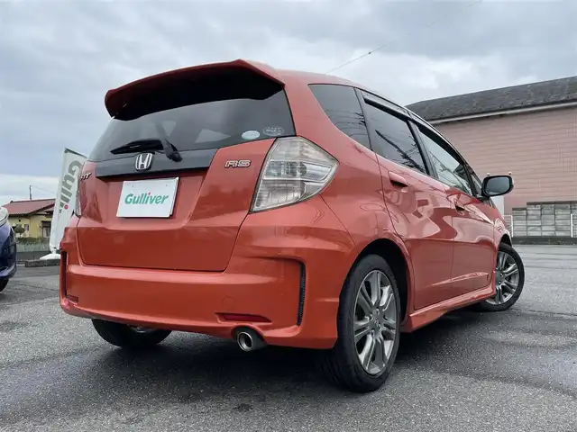 ホンダ フィット RS 群馬県 2011(平23)年 12.9万km サンセットオレンジⅡ 純正メモリナビ・TV・バックカメラ/本革ステアリング/パワーステアリング/パワーウィンドウ/ドアバイザー/純フロアマット/純正ホイール/オートライト/バックカメラ/ビルトインETC/Wエアバック