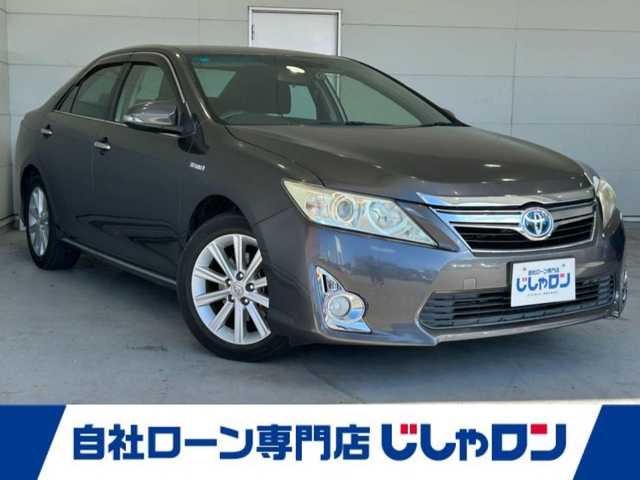 トヨタ カムリ ハイブリット 沖縄県 2012(平24)年 6.8万km グレーメタリック (株)IDOMが運営する【じしゃロンコザ店】の自社ローン対象車両になります。こちらは現金ご利用時の価格です。自社ローンご希望の方は別途その旨お申付け下さい。/・プッシュスタート　/・ナビ　/・バックカメラ　/・Ｂｌｕｅｔｏｏｔｈ接続　/・ＥＴＣ　/・ドライブレコーダー　/・クルーズコントロール　/・横滑り防止装置　/・盗難防止装置　/・純正フロアマット　/・パワーシート　/・カーテンエアバック