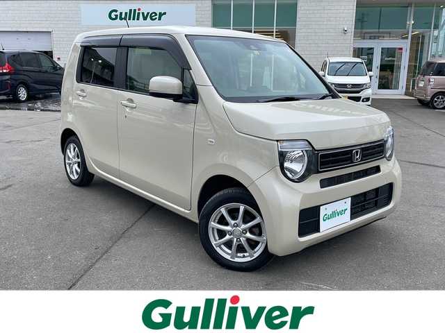ホンダ Ｎ ＷＧＮ L ホンダセンシング 道東・釧路十勝 2021(令3)年 6万km プレミアムアイボリーパールⅡ 4WD/純正メモリナビ　VXM-214VFi/　（AM/FM/CD/DVD/BT）/ビルトインETC/ドライブレコーダー/バックカメラ/純正フロアマット/シートヒーター　運転席/社外１４インチAW/ドアバイザー/MTモード付AT/アイドリングストップ/クルーズコントロール/コーナーセンサー/レーンキープアシスト/オートライト/オートマチックハイビーム/盗難防止装置/ABS/横滑り防止装置/禁煙車/Honda SENSING/・衝突軽減ブレーキ（ＣＭＢＳ）/・路外逸脱抑制機能/・先行車発進お知らせ機能/・アダプティブクルーズコントロール（ＡＣＣ）/・車線維持支援システム（ＬＫＡＳ）/・標識認識機能/・誤発進抑制機能 /・近距離衝突軽減ブレーキ
