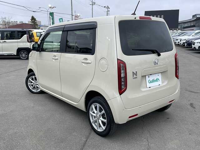 ホンダ Ｎ ＷＧＮ L ホンダセンシング 道東・釧路十勝 2021(令3)年 6万km プレミアムアイボリーパールⅡ 4WD/純正メモリナビ　VXM-214VFi/　（AM/FM/CD/DVD/BT）/ビルトインETC/ドライブレコーダー/バックカメラ/純正フロアマット/シートヒーター　運転席/社外１４インチAW/ドアバイザー/MTモード付AT/アイドリングストップ/クルーズコントロール/コーナーセンサー/レーンキープアシスト/オートライト/オートマチックハイビーム/盗難防止装置/ABS/横滑り防止装置/禁煙車/Honda SENSING/・衝突軽減ブレーキ（ＣＭＢＳ）/・路外逸脱抑制機能/・先行車発進お知らせ機能/・アダプティブクルーズコントロール（ＡＣＣ）/・車線維持支援システム（ＬＫＡＳ）/・標識認識機能/・誤発進抑制機能 /・近距離衝突軽減ブレーキ