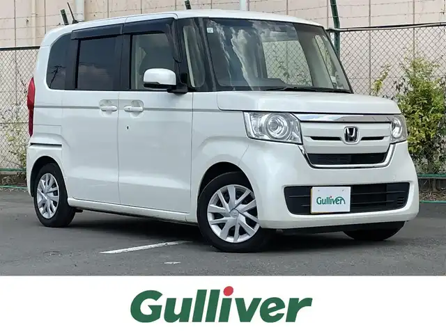 ホンダ Ｎ ＢＯＸ G L ホンダセンシング 東京都 2017(平29)年 7万km プレミアムホワイトパールⅡ Honda SENSING/・衝突軽減ブレーキ（CMBS）/・誤発進抑制機能/・後方誤発進抑制機能/・歩行者事故低減ステアリング/・路外逸脱抑制機能/・ACC（アダプティブ・クルーズ・コントロール）/・LKAS（車線維持支援システム）/・オートハイビーム/・先行車発進お知らせ機能/・標識認識機能/ナビ装着用スペシャルパッケージ/純正ナビ（VXM-184Ci）/AM/FM/CD/iPod/SD/USB/Bluetooth/バックカメラ/左側パワースライドドア/フルLEDヘッドライト（プロジェクタータイプ）/チップアップ＆ダイブダウン機構付スライドリアシート/360°スーパーUV・IRカットパッケージ/Hondaスマートキーシステム（スマートキー×２）/ETC/ドライブレコーダー/保証書/取扱説明書