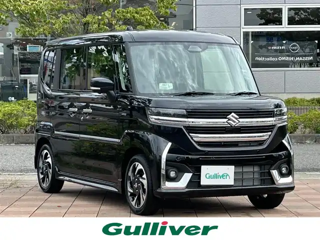 スズキ スペーシア カスタム HYBRID XS ターボ 福島県 2025(令7)年 0.1千km ブルーイッシュブラックパール3 スズキセーフティサポート/デュアルセンサーブレーキサポートII/アダプティブクルーズコントロール/標識認識機能/発進お知らせ機能/車線維持支援機能/車線逸脱抑制機能/車線逸脱警報機能/ふらつき警報機能/誤発進抑制機能/ハイビームアシスト/ヘッドアップディスプレイ/純正ナビゲーション/【USB/BT/TV】/全方位モニター/両側電動スライドドア/前席シートヒーター/ステアリングヒーター/ステアリングリモコン/パドルシフト/マルチユースフラップ/スリムサーキュレーター/ロールサンシェード/シートバックテーブル/LEDオートライト/LEDフォグランプ