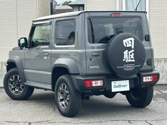 スズキ ジムニー シエラ JC 青森県 2024(令6)年 3万km ミディアムグレー AIS評価点5点/4WD/寒冷地仕様/ワンオーナー/純正メモリナビ/・フルセグTV/Am/FM/CD/DVD/BT/純正15AW/純正フロアマット/シートヒーター前席/コーナーセンサー/フォグランプ/オートライト/クルーズコントロール/アイドリングストップ/衝突軽減システム/ヒルスタートアシスト/車線逸脱警報/横滑り防止機能/盗難防止装置/UVカットガラス/プライバシーガラス/ETC/スペアキー/保証書/取扱説明書/整備記録簿