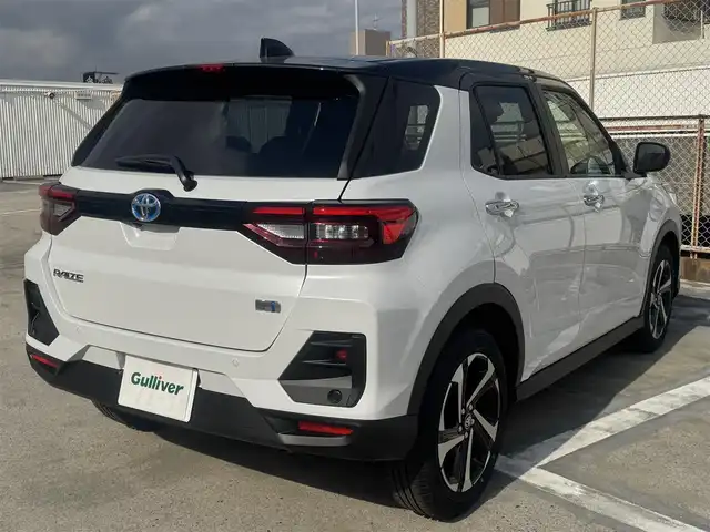 トヨタ ライズ Z 広島県 2025(令7)年 0.1千km ブラックマイカメタリック/シャイニングホワイトパール 走行距離22km（登録時）/新車ワンオーナー/ブラック＆パールホワイト/MOPパノラミックビューパッケージ/・9インチディスプレイオーディオ/・パノラミックビュー（フロント/サイド/バックカメラ）/・フルセグテレビ/・Bluetooth/・AppleCarPlay/・AndroidAuto/・外部入力USB端子/・HDMI端子/・ステアリングスイッチ/・助手席側サイドアンダーミラー無/ビルトインETC/LEDヘッドランプ/LEDシーケンシャルターンランプ/LEDフロントフォグランプ/スマートアシスト/・衝突回避支援ブレーキ機能/・衝突警報機能/・車線逸脱警報機能/・車線逸脱抑制制御機能/・ふらつき警報/・路側逸脱警報/・ブレーキ制御付誤発進抑制機能/・先行車発進お知らせ機能/・アダプティブドライビングビーム/・コーナーセンサー/・標識認識機能（進入禁止/最高速度/一時停止）/・アダプティブクルーズコントロール/・サイドビューランプ/・レーンキープコントロール/MOPブラインドスポットモニター/MOPリアクロストラフィックアラート/スマートキー×2/フロアマット/新車保証書有/取扱説明書有/MOP（メーカーオプション）