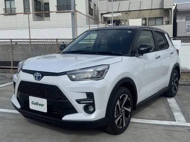 トヨタ ライズ Z 広島県 2025(令7)年 0.1千km ブラックマイカメタリック/シャイニングホワイトパール 走行距離22km（登録時）/新車ワンオーナー/ブラック＆パールホワイト/MOPパノラミックビューパッケージ/・9インチディスプレイオーディオ/・パノラミックビュー（フロント/サイド/バックカメラ）/・フルセグテレビ/・Bluetooth/・AppleCarPlay/・AndroidAuto/・外部入力USB端子/・HDMI端子/・ステアリングスイッチ/・助手席側サイドアンダーミラー無/ビルトインETC/LEDヘッドランプ/LEDシーケンシャルターンランプ/LEDフロントフォグランプ/スマートアシスト/・衝突回避支援ブレーキ機能/・衝突警報機能/・車線逸脱警報機能/・車線逸脱抑制制御機能/・ふらつき警報/・路側逸脱警報/・ブレーキ制御付誤発進抑制機能/・先行車発進お知らせ機能/・アダプティブドライビングビーム/・コーナーセンサー/・標識認識機能（進入禁止/最高速度/一時停止）/・アダプティブクルーズコントロール/・サイドビューランプ/・レーンキープコントロール/MOPブラインドスポットモニター/MOPリアクロストラフィックアラート/スマートキー×2/フロアマット/新車保証書有/取扱説明書有/MOP（メーカーオプション）