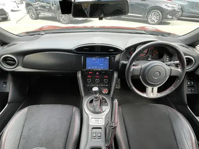 トヨタ ８６ GT リミテッド 長野県 2012(平24)年 8.5万km オレンジメタリック カロッツェリアメモリナビ（AVIC-ZH77）/AM・FM・DVD・CD・SD/Bluetooth Audio/フルセグテレビ/バックカメラ/純正17インチアルミホイール/ハーフレザーシート/シートヒーター/パドルシフト/HIDヘッドライト/オートライト/フォグランプ/プッシュスタート/スマートキー/純正フロアマット/横滑り防止装置/ETC