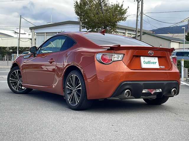 トヨタ ８６ GT リミテッド 長野県 2012(平24)年 8.5万km オレンジメタリック カロッツェリアメモリナビ（AVIC-ZH77）/AM・FM・DVD・CD・SD/Bluetooth Audio/フルセグテレビ/バックカメラ/純正17インチアルミホイール/ハーフレザーシート/シートヒーター/パドルシフト/HIDヘッドライト/オートライト/フォグランプ/プッシュスタート/スマートキー/純正フロアマット/横滑り防止装置/ETC