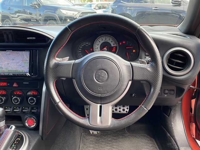 トヨタ ８６ GT リミテッド 長野県 2012(平24)年 8.5万km オレンジメタリック カロッツェリアメモリナビ（AVIC-ZH77）/AM・FM・DVD・CD・SD/Bluetooth Audio/フルセグテレビ/バックカメラ/純正17インチアルミホイール/ハーフレザーシート/シートヒーター/パドルシフト/HIDヘッドライト/オートライト/フォグランプ/プッシュスタート/スマートキー/純正フロアマット/横滑り防止装置/ETC