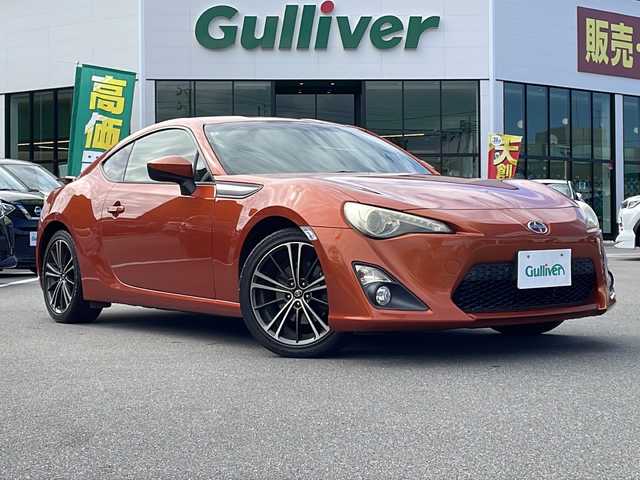 トヨタ ８６ GT リミテッド 長野県 2012(平24)年 8.5万km オレンジメタリック カロッツェリアメモリナビ（AVIC-ZH77）/AM・FM・DVD・CD・SD/Bluetooth Audio/フルセグテレビ/バックカメラ/純正17インチアルミホイール/ハーフレザーシート/シートヒーター/パドルシフト/HIDヘッドライト/オートライト/フォグランプ/プッシュスタート/スマートキー/純正フロアマット/横滑り防止装置/ETC
