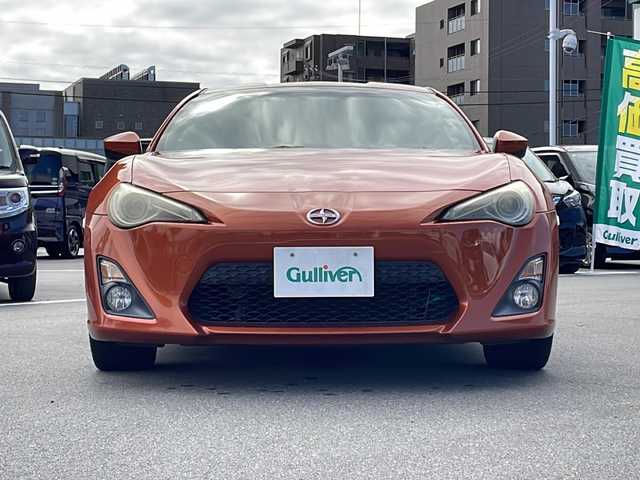 トヨタ ８６ GT リミテッド 長野県 2012(平24)年 8.5万km オレンジメタリック カロッツェリアメモリナビ（AVIC-ZH77）/AM・FM・DVD・CD・SD/Bluetooth Audio/フルセグテレビ/バックカメラ/純正17インチアルミホイール/ハーフレザーシート/シートヒーター/パドルシフト/HIDヘッドライト/オートライト/フォグランプ/プッシュスタート/スマートキー/純正フロアマット/横滑り防止装置/ETC