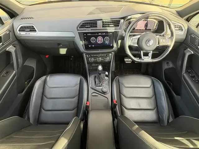 フォルクスワーゲン ティグアン TSI Rライン ディナウディオ 石川県 2020(令2)年 3万km 黒 純正HDDナビ/Bluetooth・AM/FM・CD・DVD・USB・AUX/フルセグTV/ディナウディオプレミアムサウンド/ETC2.0/全方位カメラ/純正ドライブレコーダー（前後）/クルーズコントロール/ルーフレール/シートヒーター（全席）/シートメモリー/AUTO HOLD/パドルシフト/パワーバックドア/アンチロック・ブレーキ・システム/横滑り防止装置/コーナーセンサー（前後）/レーンキープアシスト/盗難防止装置/パーキングアシスト/アイドリングストップ/エアバッグ（W+サイド）/衝突被害軽減システム/カーテンエアバッグ/純正フロアマット/純正アルミホイール/スマートキー/プッシュスタート