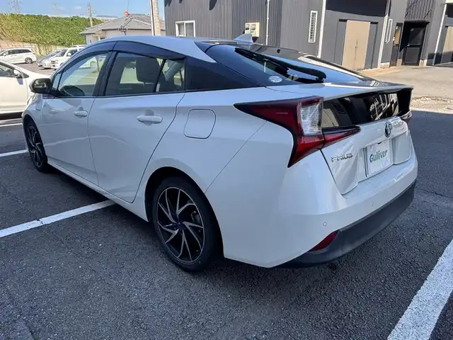 トヨタ プリウス S 長崎県 2019(平31)年 3.5万km ホワイトパールクリスタルシャイン ワンオーナー/純正メモリナビ/（CD/DVD/BT/フルセグ）/バックカメラ/衝突軽減システム/レーンアシスト/レーダークルーズ/ETC/モデリスタ17インチAW/ステアリングスイッチ/オートライト/スマートキー/プッシュスタート