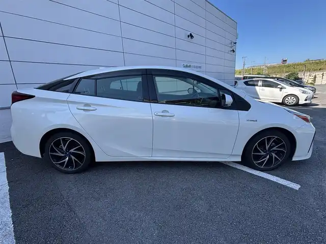 トヨタ プリウス S 長崎県 2019(平31)年 3.5万km ホワイトパールクリスタルシャイン ワンオーナー/純正メモリナビ/（CD/DVD/BT/フルセグ）/バックカメラ/衝突軽減システム/レーンアシスト/レーダークルーズ/ETC/モデリスタ17インチAW/ステアリングスイッチ/オートライト/スマートキー/プッシュスタート
