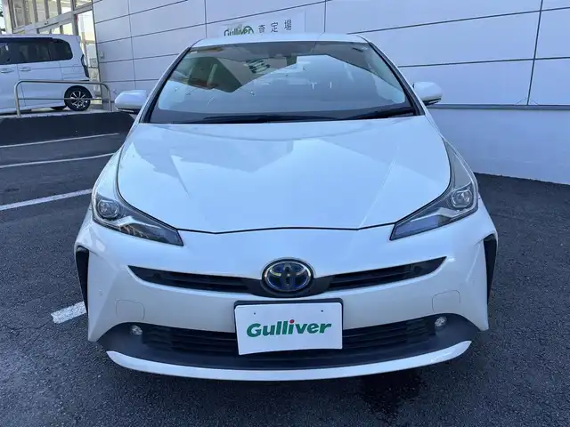 トヨタ プリウス S 長崎県 2019(平31)年 3.5万km ホワイトパールクリスタルシャイン ワンオーナー/純正メモリナビ/（CD/DVD/BT/フルセグ）/バックカメラ/衝突軽減システム/レーンアシスト/レーダークルーズ/ETC/モデリスタ17インチAW/ステアリングスイッチ/オートライト/スマートキー/プッシュスタート