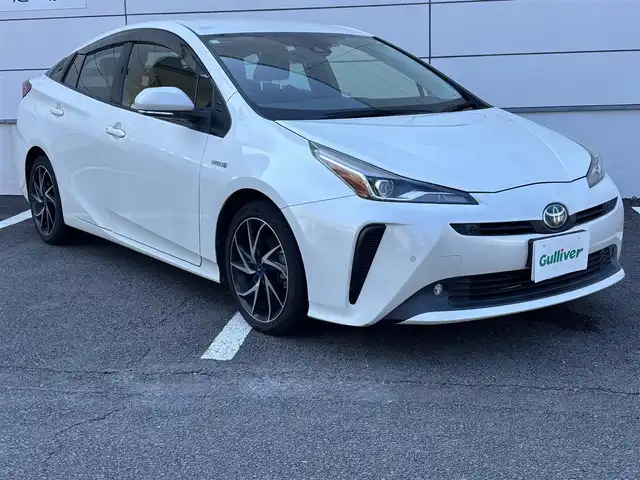 トヨタ プリウス S 長崎県 2019(平31)年 3.5万km ホワイトパールクリスタルシャイン ワンオーナー/純正メモリナビ/（CD/DVD/BT/フルセグ）/バックカメラ/衝突軽減システム/レーンアシスト/レーダークルーズ/ETC/モデリスタ17インチAW/ステアリングスイッチ/オートライト/スマートキー/プッシュスタート