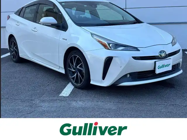 トヨタ プリウス S 長崎県 2019(平31)年 3.5万km ホワイトパールクリスタルシャイン ワンオーナー/純正メモリナビ/（CD/DVD/BT/フルセグ）/バックカメラ/衝突軽減システム/レーンアシスト/レーダークルーズ/ETC/モデリスタ17インチAW/ステアリングスイッチ/オートライト/スマートキー/プッシュスタート