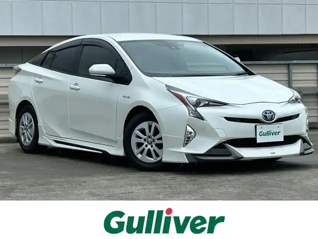 トヨタ プリウス Sセーフティプラス 静岡県 2016(平28)年 7万km ホワイトパールクリスタルシャイン 純正7型ナビ/トヨタセーフティーセンス/フルセグTV /HDMI/Bluetooth/FM/AM/純正モデリスタエアロ/追従クルコン/ドラレコ/バックカメラ/オートライト/オートハイビーム/デュアルエアコン/純正15AW