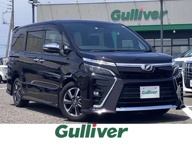 トヨタ ヴォクシー ZS 煌 島根県 2018(平30)年 6万km ボルドーマイカメタリック 社外SDナビ(CD/DVD/BT/フルセグ)/プリクラッシュセーフティー/レーントレーシングアシスト/オートハイビーム/両側パワースライドドア /オートライト/アイドリングストップ/クルーズコントロール/ETC/純正ドアバイザー/純正フロアマット/電動格納ミラー/ミラーウィンカー